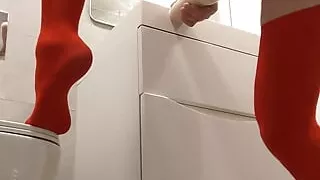 Horny in red stockings and suspenders