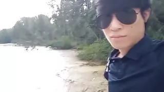 This Asian Gay Twink Has Something Shoved up His Ass and Sticking Out of His Butt as He Walks in Front of Everyone