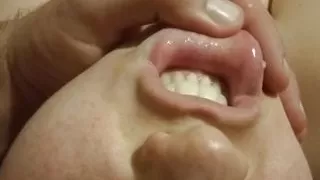 A beautiful slut fucks herself with an artificial penis. Sucks dick under running water. Games in the bathroom.