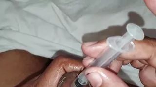 Srilankan younger boy oil injection to he Big Penis and hand job in oily Penis