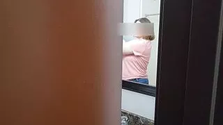 Peaking in on milf in the bathroom
