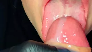 Close up of My girlfriend massages my cock and tastes my cum
