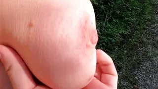 Swinging breasts in the evening sun