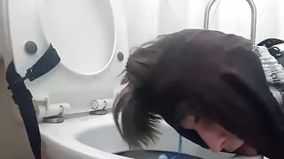 Femboy slave licks dirty toilet clean