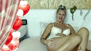 Hot housewife Lukerya on the bed in white lingerie