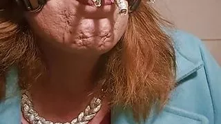 Smoking 3 cigarettes through a ballgag and eating the ashes