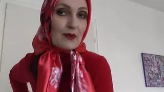 Lady Victoria Valente Showed Elegant Satin Headscarves with a Red Cashmere Turtleneck Sweater