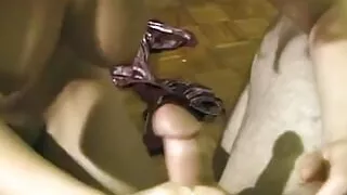 She's using her big tits and wet mouth to give his small dick a blowjob