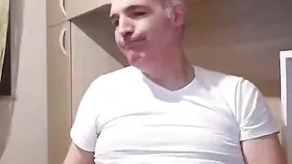 A Nice Handjob with a Lake of Sperm on the Computer Table