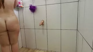 Very naughty stepmom takes a shower with the door open and rolls naked with her thick cock!