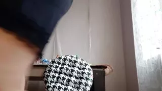 MILF with huge tits masturbates in a mini skirt