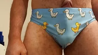 Speedo cum. Rubbing, vibrating, masturbating small penis bulge in speedo, swim trunks, brief. Please humiliate in the comments.