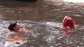 Hot red haired hitchhiker has lesbian sex in nature