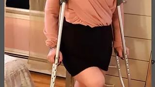 Sexy blonde amputee Bionic Beauty heels and crutches