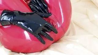 OnlyFans teaser - This is my red latex catsuit with integrated condoms!