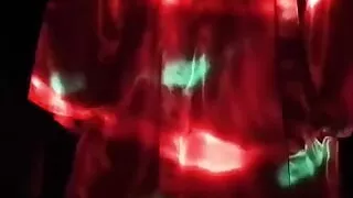 Gliding through red pajamas.