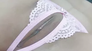 She touches herself because of the opening in her panties and can't stand masturbating because of how wet her pussy is