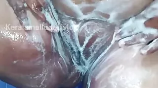 Malayali Housewife Nude Bathing teen mallu girl bathing and boobs massage