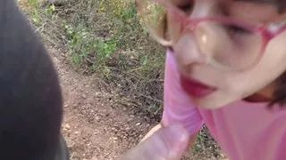 Latina teen gives a blowjob in the woods