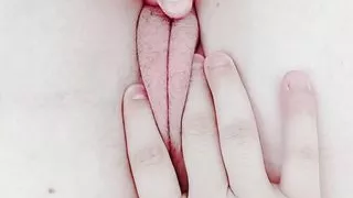 just woken up, opening her pussy still wet and tight with fluids from the night