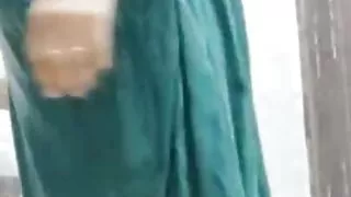 Desi Indian aunty taking bath and squeezing her tits and ass