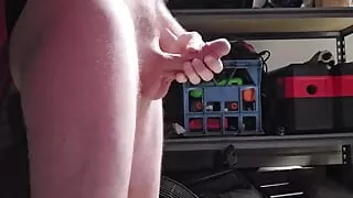 Naked outdoors, stroking my big cock and cumming.