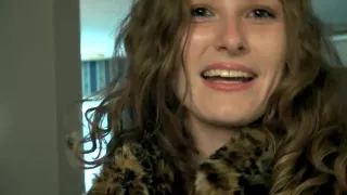 Kiss Montress strips wearing a fur jacket - WeAreHairy