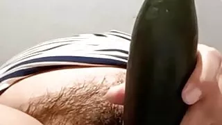 Hot girl putting cucumber in hot video call