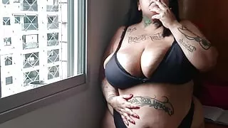 BBW Smoking Cigarette on Her Balcony
