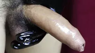 close-up cock massage with lubrication in sexy gloves