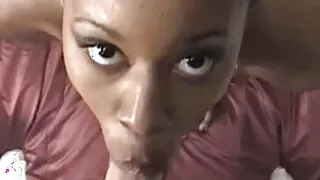 Ebony queen kneeling down and sucking his small white cock