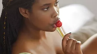 Ebony hottie and lollipop