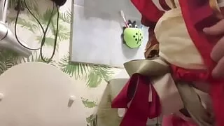 Peeing in vintage boniche outfit and with shackles