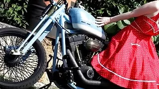 German blonde camgirl dangles her boobs on the motorcycle, and after that she makes a show at EroticOnly!