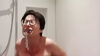 Milf Julie squirts in the bathroom