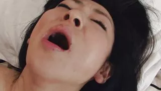Japanese brunette Milf Emiko Koike blows her husband's hard cock uncensored.