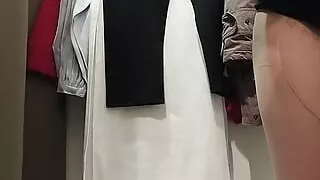 Sexy brunette tries on clothes in fitting room. I&#039;m looking at a hairy, hairy pussy, big tits, big ass.