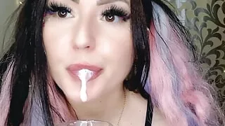 Dominatrix Nika spits into a glass