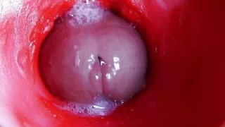 A huge cock inside a wet hole spews liquid and will soon fill with milk