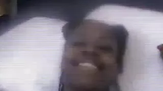 A sexy ebony babe is sucking his small white dick on the bed