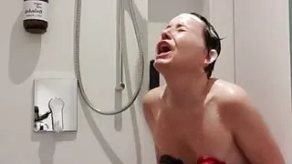 Milf Julie showers and shaves with orgasm