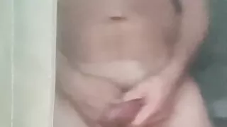 Hotel window stroking cock