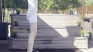 outdoor stretching in white dress