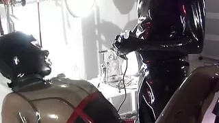 Dominating two whores in latex