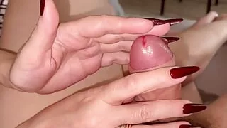 The lesbian milf jerked off me and herself with her long nails. Cumming right on her black panties