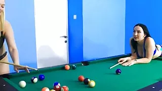 Big-boobed hotties playing a strip game of billiards