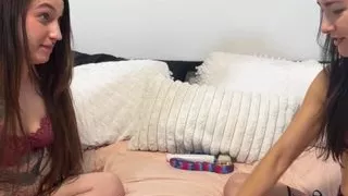 Two sexy girls are using sex toys as rewards for a well-played strip games