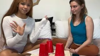 Teen couple plays a Find The Ball strip game on the bed