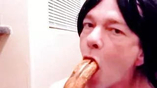 Horny crossdresser deepthroats whole banana