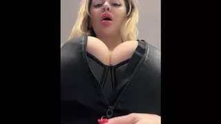 Big natural tits bursting out elastic leather